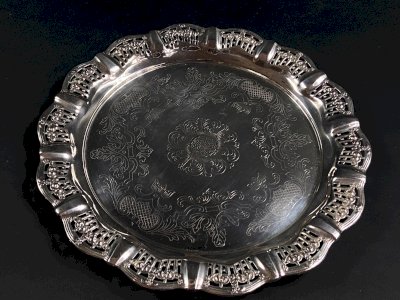 Circular tray with openwork edges in Regency style, silver-plated.