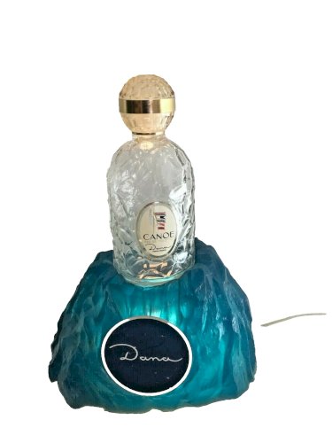 PLV plastique façon rocher éclairant parfum Dana + bouteille Canoé sans parfum