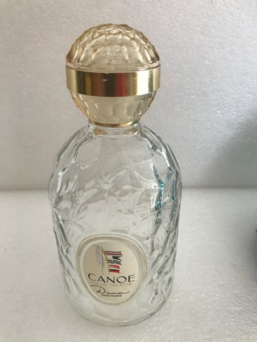 PLV plastique façon rocher éclairant parfum Dana + bouteille Canoé sans parfum