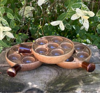 Vintage retro brown snail frying pans