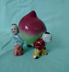 Asian porcelain lucky charm