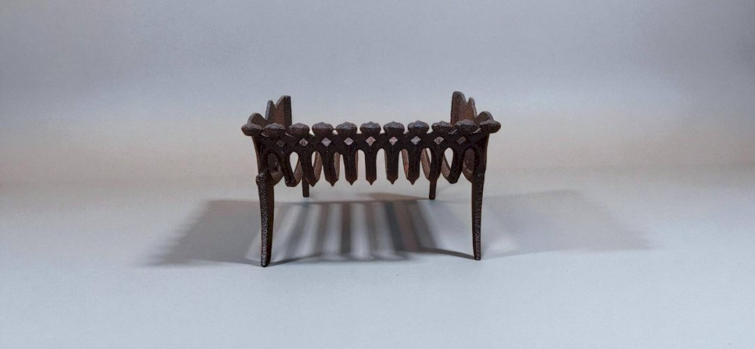 Porte-buche de cheminée en fonte