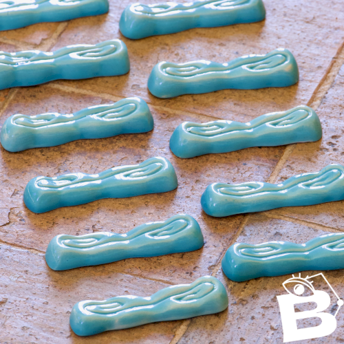 Porte-couteaux anciens Art Deco en faïence turquoise