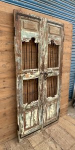 Art deco teak patio door with original patina.
