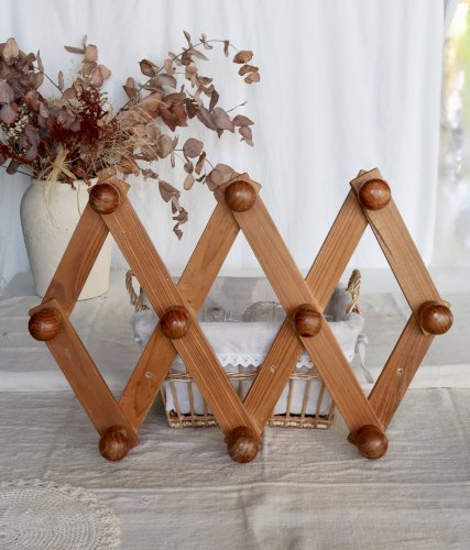 Porte-manteau mural ancien accordéon en pin foncé, 10 patères en bois