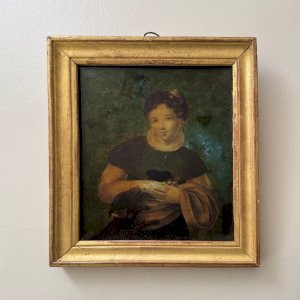 Portrait of a young girl from the 18th century set under glass in a frame with a molding A5685