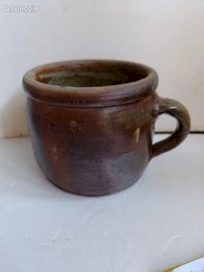 stoneware pot with handle in good condition