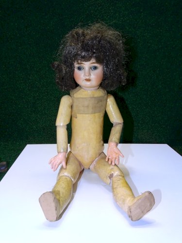 -POUPEE TETE PORCELAINE BOUCHE OUVERTE 4 DENTS Marquée B et 0 Breveté SGDG    D