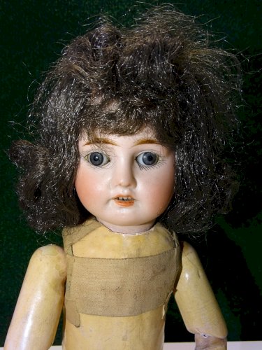 -POUPEE TETE PORCELAINE BOUCHE OUVERTE 4 DENTS Marquée B et 0 Breveté SGDG    D