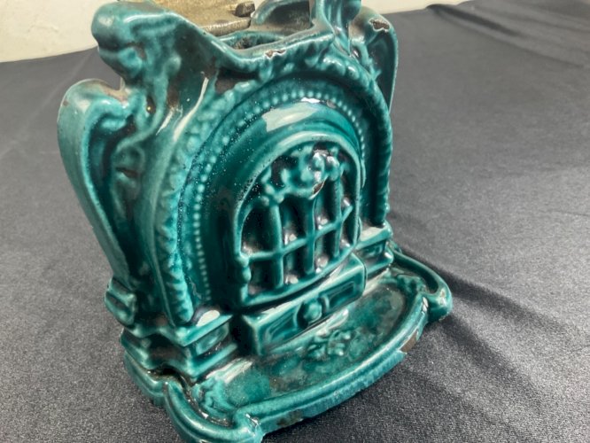 Pyrogène en Fonte Emaillée Vert en forme de poile à bois  Art Déco 1920-30 .