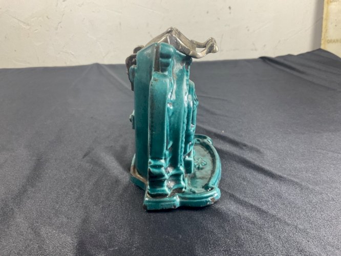 Pyrogène en Fonte Emaillée Vert en forme de poile à bois  Art Déco 1920-30 .