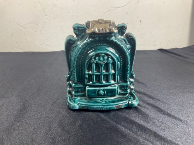 Pyrogène en Fonte Emaillée Vert en forme de poile à bois  Art Déco 1920-30 .