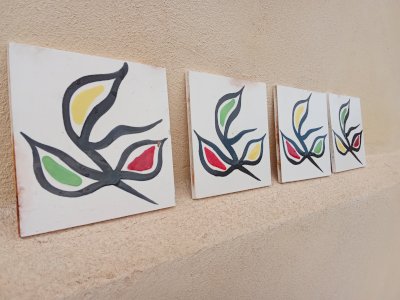 Four postmodern Desvres ceramic tiles