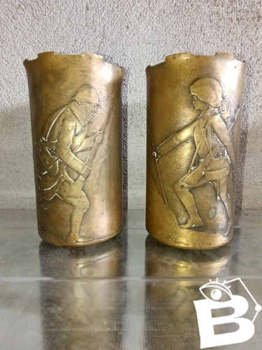 rare paire de douille sculptée ,daté et signée 1918 en bon etat