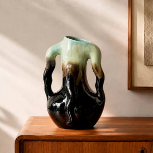 Rare ancient organic vase from Thulin in glazed flame pottery.