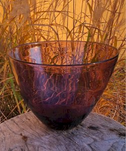 Plum colored glass salad bowl