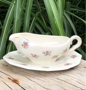 Antique porcelain gravy boat Céranord