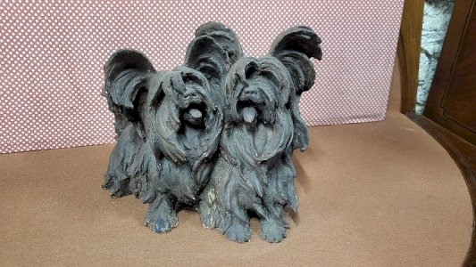 ANIMAL SCULPTURE OF 2 DOGS IN TERRACOTTA