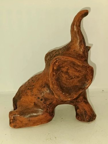 sculpture delephant en terre cuite travail artisanal en bon etat