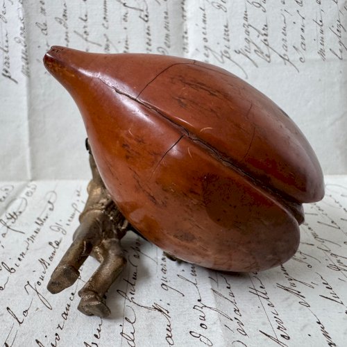 Sculpture en bronze d'un marin poussant une mangue en corozo début XIXe M4067