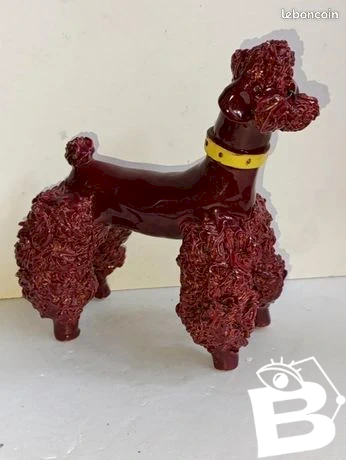sculpture en ceramique en forme de caniche en bon etat