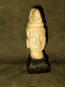 stone sculpture face in the Maya or Aztec style in good condition