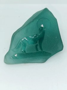 green glass sculpture decorated with wolves signed by Siku in good condition