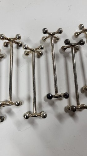 SERIE DE 12 PORTE COUTEAUX ANCIENS N° 1