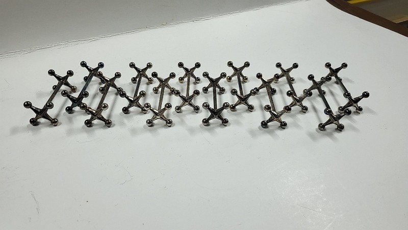 SERIE DE 12 PORTE COUTEAUX ANCIENS N° 2