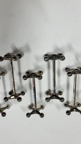 SERIE DE 12 PORTE COUTEAUX ANCIENS N° 2