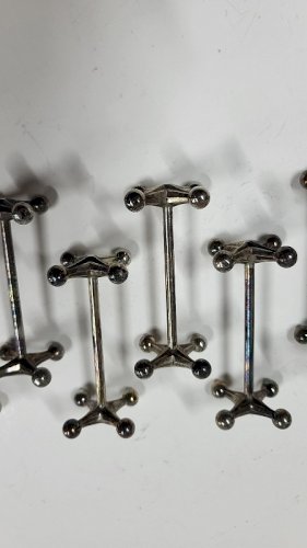 SERIE DE 12 PORTE COUTEAUX ANCIENS N° 2