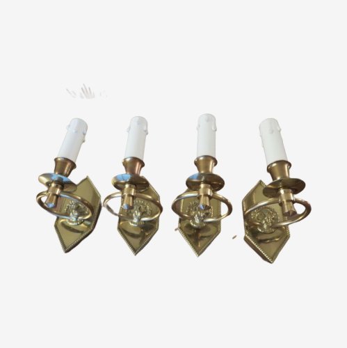 SERIE DE 4 APPLIQUES ART DECO  AUX LIONS  EN LAITON MASSIF DORE 