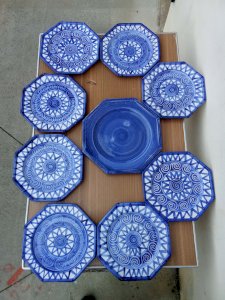 Set of eight octagonal blue and white plates from the mid-century La Roue Vallauris attributed to Robert Picault, along with a blue dish signed Robert Picault.