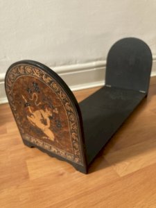 Bookends with a divine creature design in marquetry