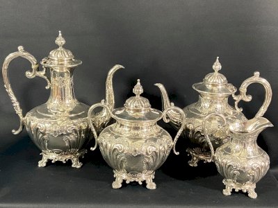 Silver-plated metal tea and coffee service in Louis XV style, teapot, coffee pot, sugar bowl.