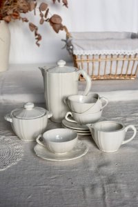 Service à thé pour 4 vintage en faïence ivoire au marli chantourné
