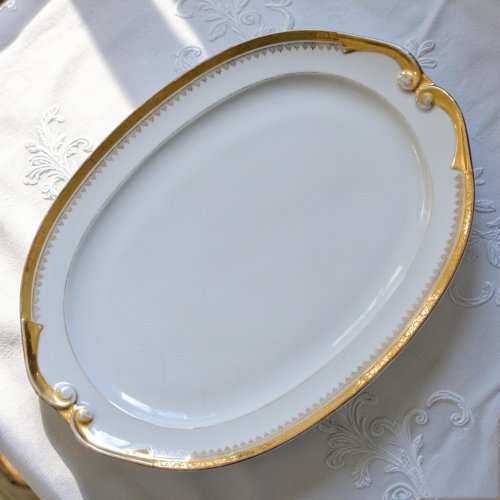 Service ancien en porcelaine de Limoges à lor fin, Peconnet