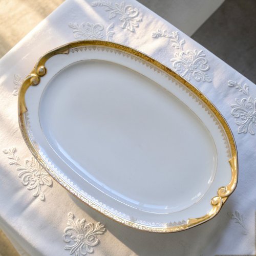 Service ancien en porcelaine de Limoges à lor fin, Peconnet