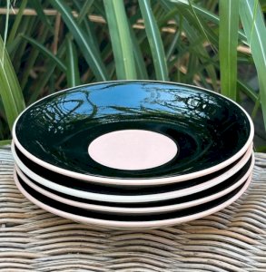 Black and coral Villeroy & Boch saucers