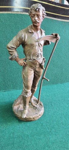 STATUE EN REGULE FERMIER LE FAUCHEUR