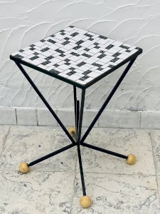 Wrought iron stele and black and white tiled tabletop from the 1960s.