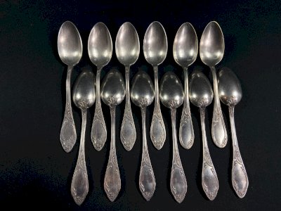 Set of 12 small silver-plated metal spoons in Louis XV style.