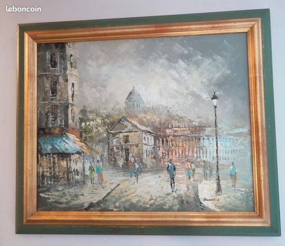 Superbe tableau représentant la place du tertre a paris avec en fond le sacre coeur signé Caroline Burnett datant des années 40-50 en bon etat
