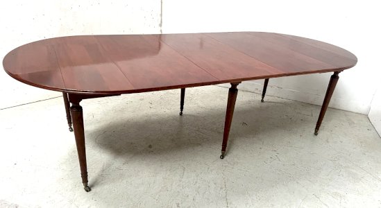 Louis XVI style mahogany table with six legs, 19th century.