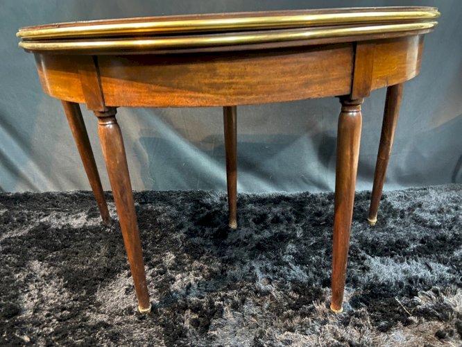 Table demi-lune acajou fin d'époque Louis XVI formant console table à jeu XVIIIe