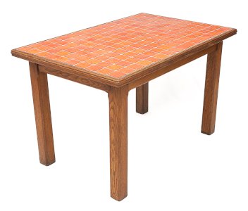 Table known as a kitchen table made of solid oak. Top in ceramic tiles. Multiple shades of orange. Sturdy and stable. Circa 1950.