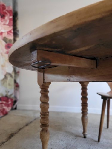 Table ronde  à volets en bois maasif