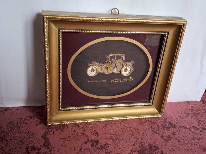 Tableau authentique Ken Broadbent réalisé avec des pièces d'horlogerie