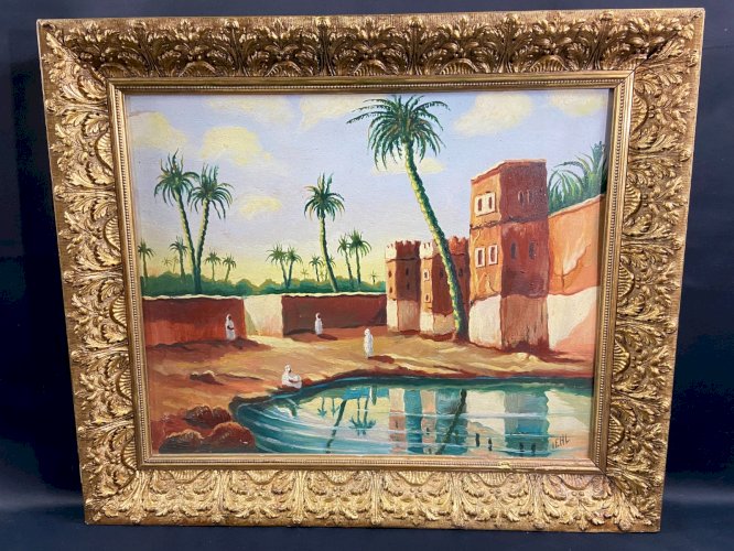 Tableau orientaliste représentant une vue animée d'une oasis palmiers Sud Maroc
