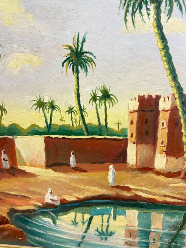 Tableau orientaliste représentant une vue animée d'une oasis palmiers Sud Maroc